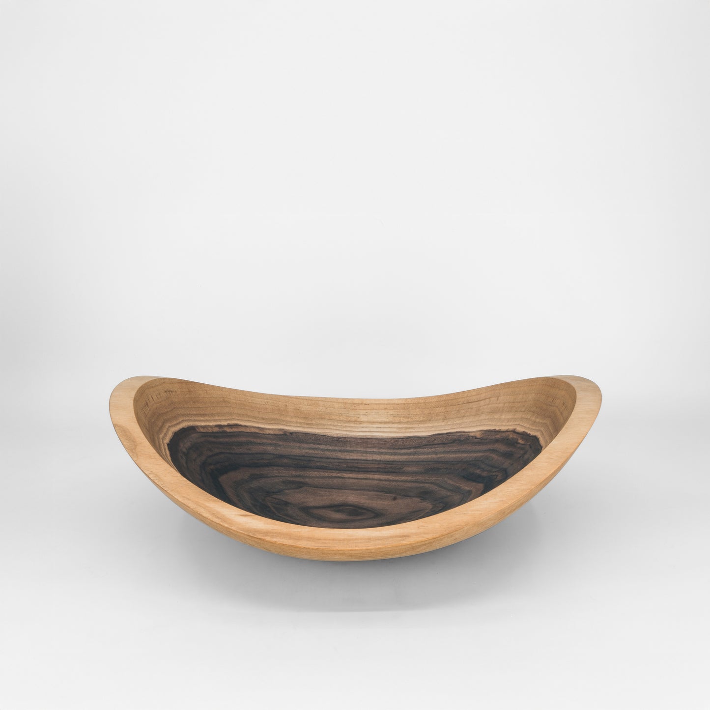 Wooden bowl on a grey background