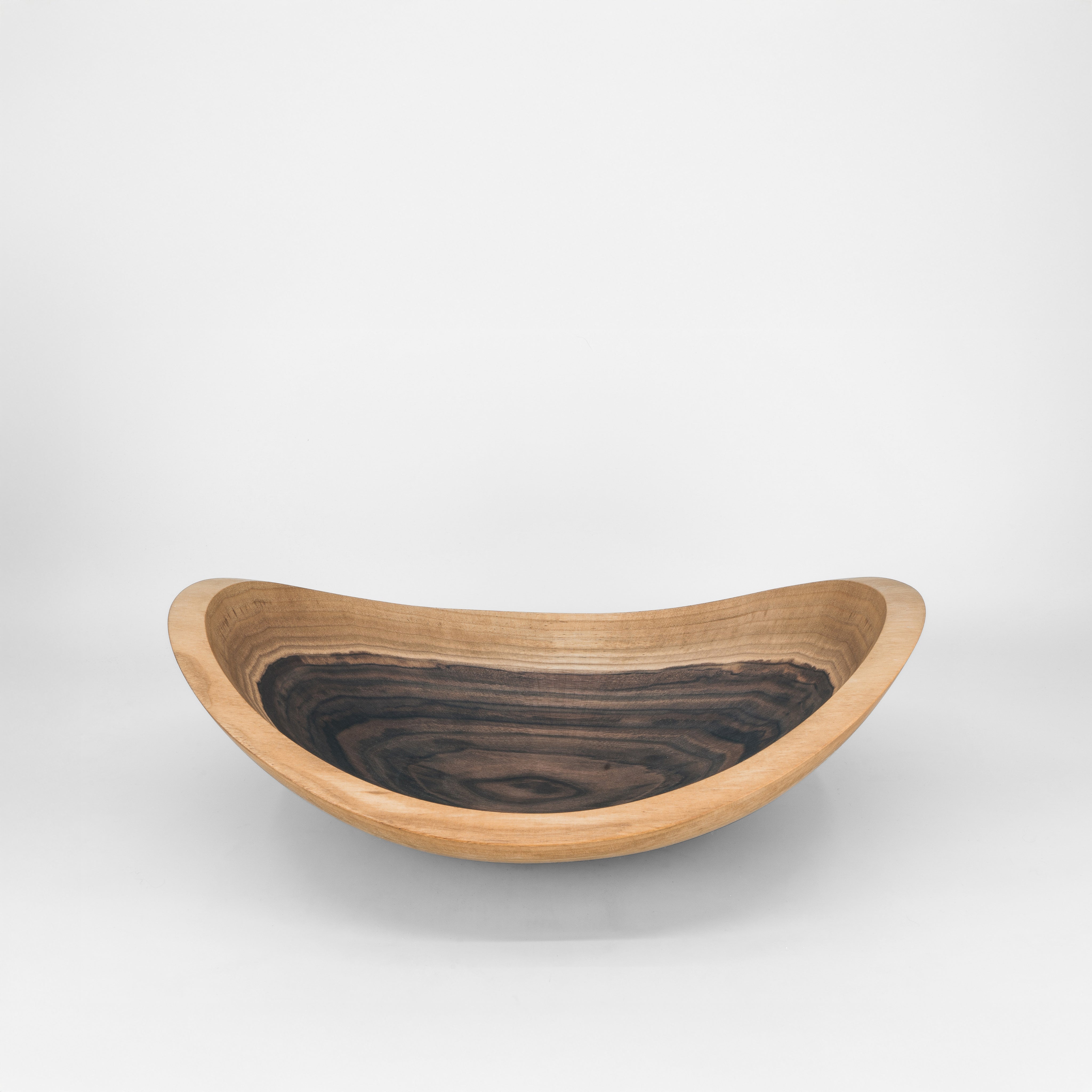 Wooden bowl on a grey background