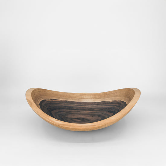 Wooden bowl on a grey background