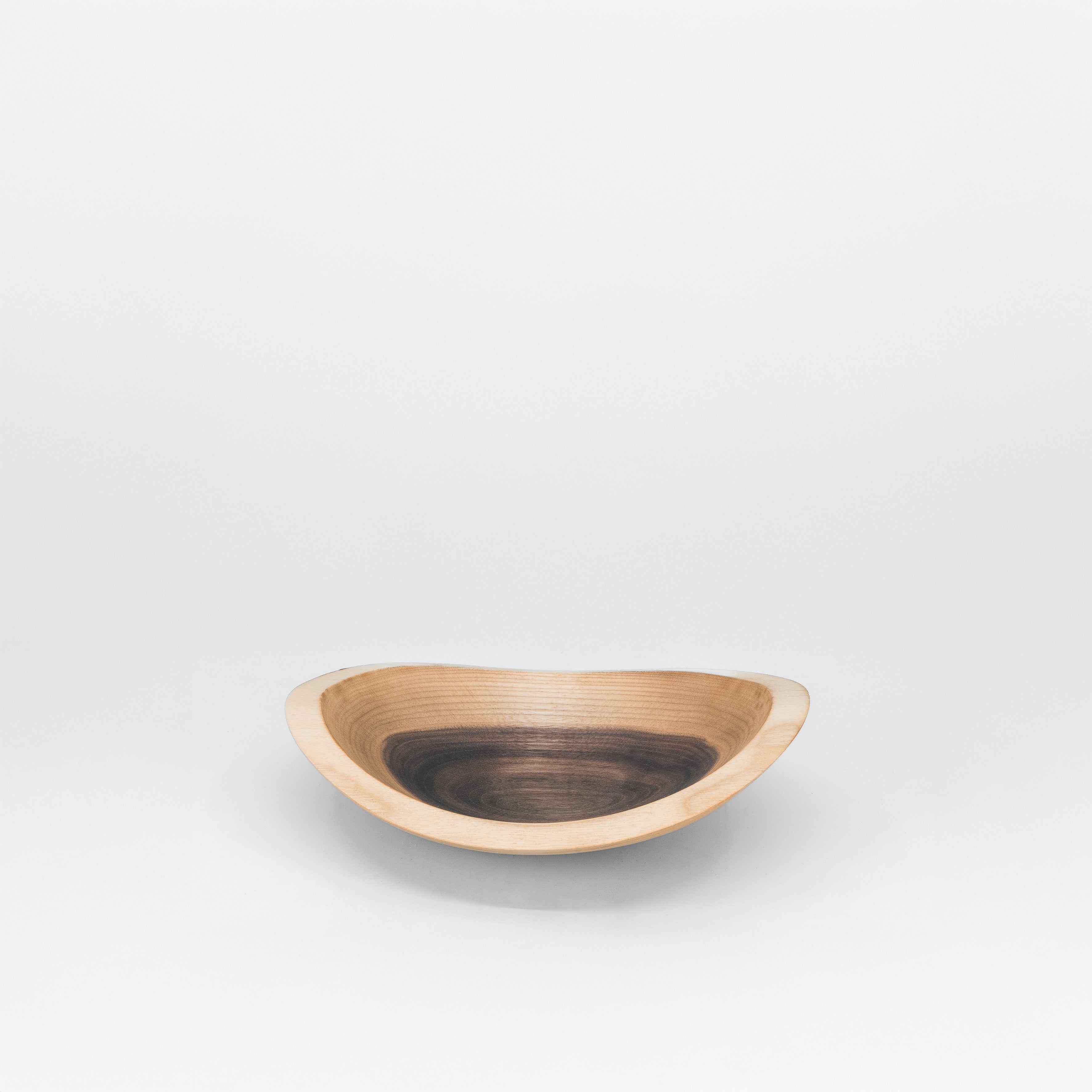 Wooden bowl on a grey background