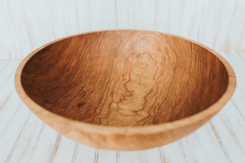 A 20-inch diameter solid cherry bowl