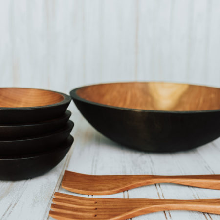Every five-bowl Ebonized Cherry wooden dish set comes with a 15-inch serving bowl, (4) 7-inch side salad bowls, and a set of 12-inch servers.