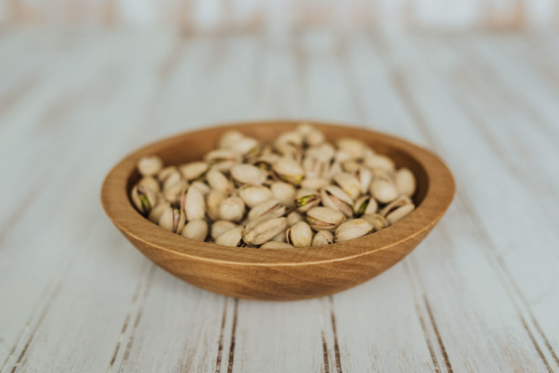7-inch Beech Side Salad Serving Bowl filled with pistachios