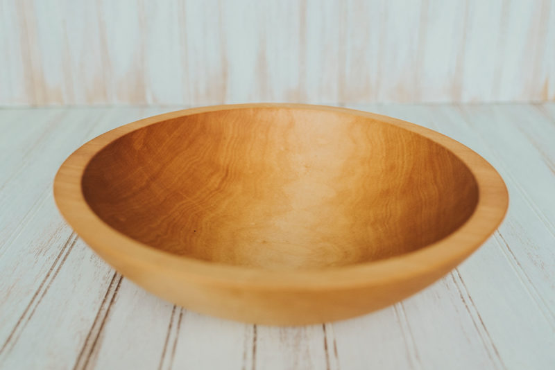 A 12-inch diameter solid maple bowl