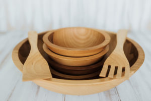 15 inch Beech wood bowl set with four small bowls and two utensils.