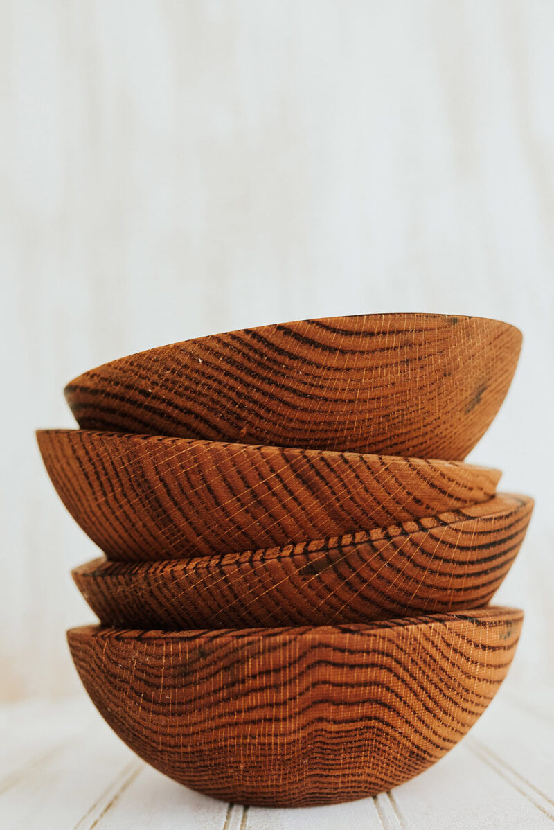 7 inch torched red oak bowls in a stack.