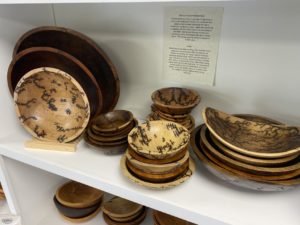 Fractal wood burning bowls on display in the Holland Bowl Mill showroom.