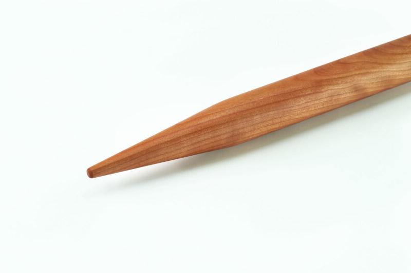 A cherry wood French rolling pin