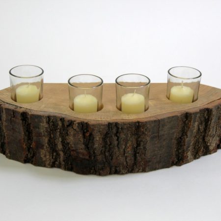 A 4 piece wooden candle holder